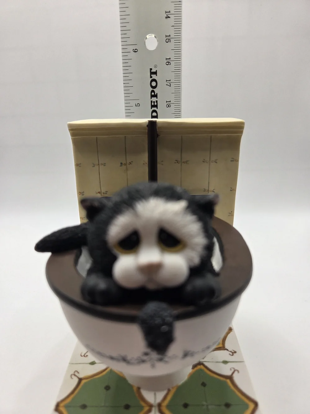 R200. Down The Pan Black and White Cat in Toilet Figurine